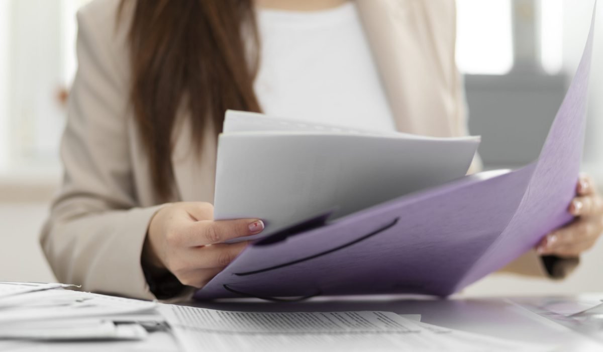 young-adult-organizing-documents